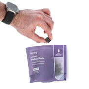UPSY Wellness | UNWIND Mellow-Tonin CBD Gummies Pouch with a Hand Holding a Gummy Next to Packaging